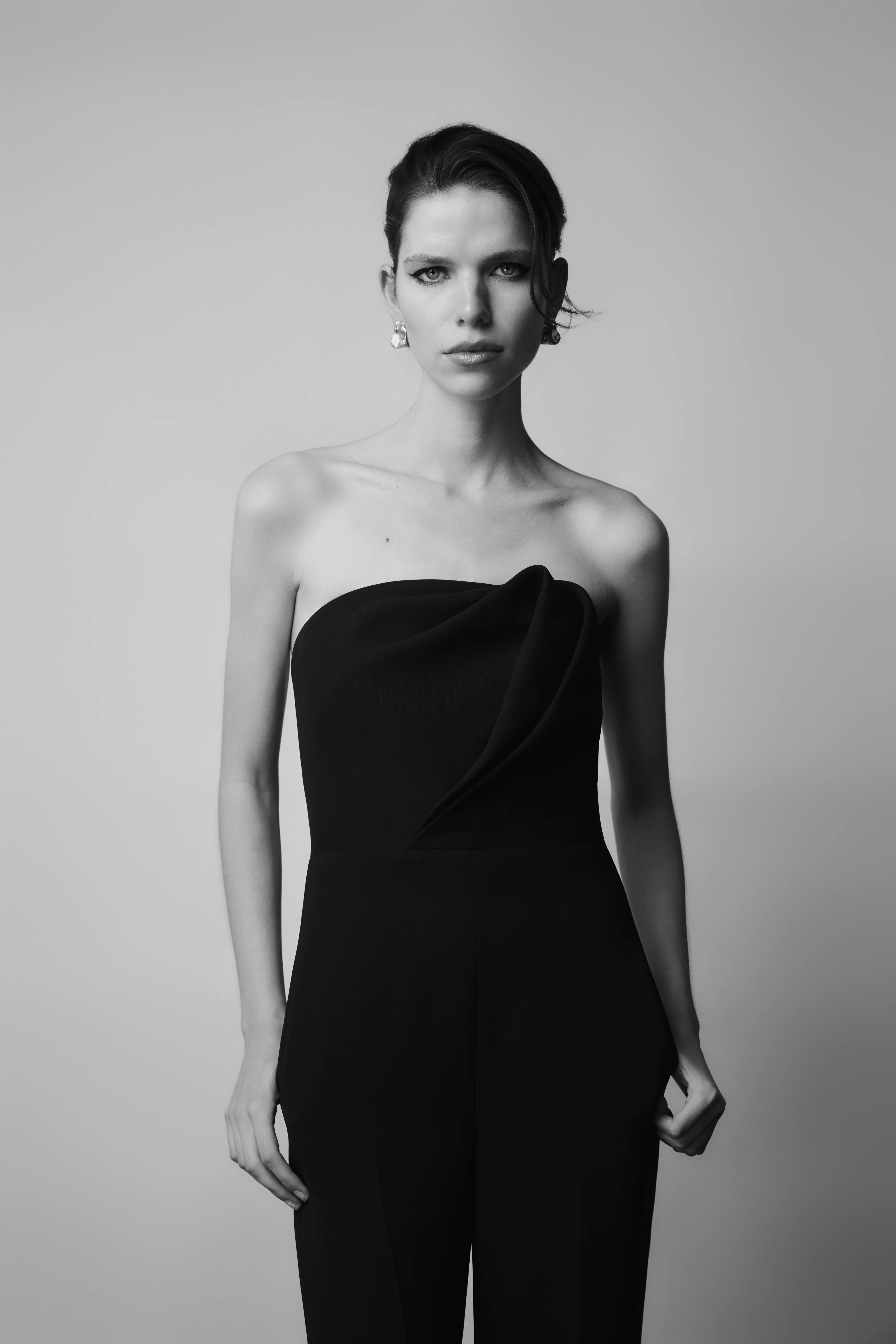 BLACK CREPE SCULPTURAL JUMPSUIT - Image 5